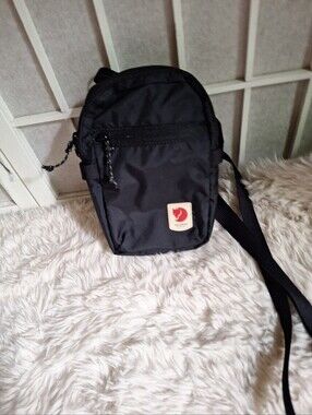 Fjallraven Black High Coast Pocket.